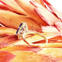 Grace Defined Pear Shaped Diamond Halo and Tanzanite Yellow Gold Ring