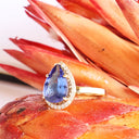 Grace Defined Pear Shaped Diamond Halo and Tanzanite Yellow Gold Ring