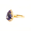 Grace Defined Pear Shaped Diamond Halo and Tanzanite Yellow Gold Ring