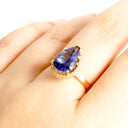 Grace Defined Pear Shaped Diamond Halo and Tanzanite Yellow Gold Ring
