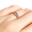 Graceful Diamond Shouldered Tanzanite and Tsavorite Rose Gold Ring