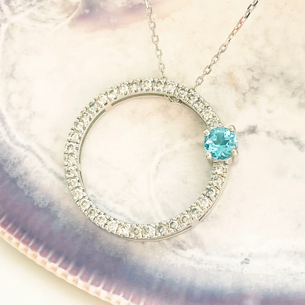 Blue Topaz and Diamond Halo Pendant