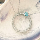 Blue Topaz and Diamond Halo Pendant