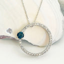 London Blue Topaz and Diamond Halo Pendant