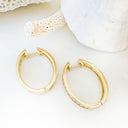 Standout Channel Set White Diamond Hoop Yellow Gold Earrings