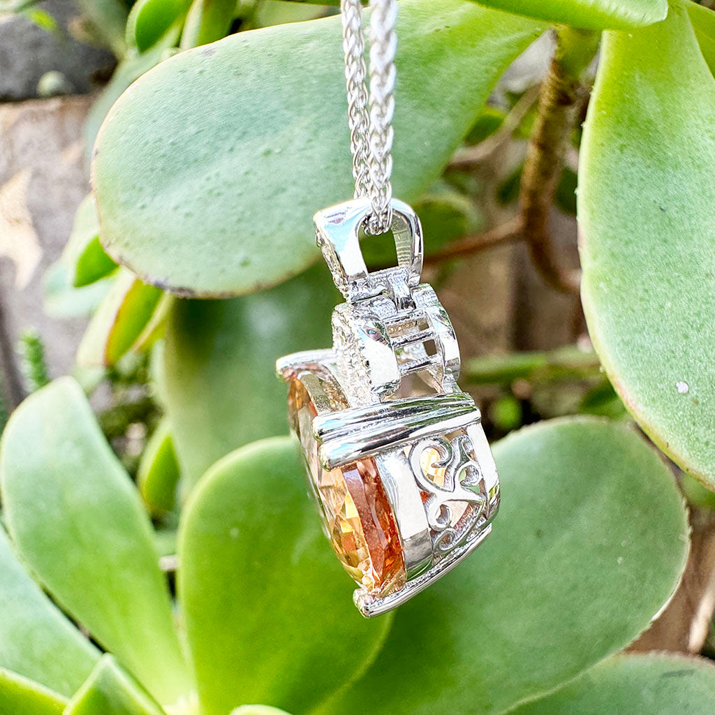 Elegantly Regal Peach Oval Morganite and Decorative Diamond Bale Pendant