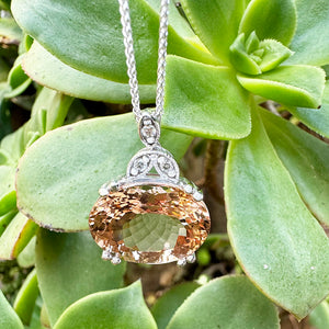Elegantly Regal Peach Oval Morganite and Decorative Diamond Bale Pendant