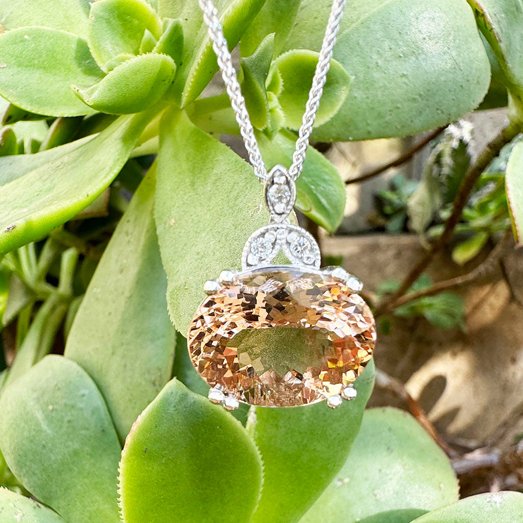 Elegantly Regal Peach Oval Morganite and Decorative Diamond Bale Pendant