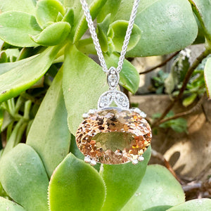 Elegantly Regal Peach Oval Morganite and Decorative Diamond Bale Pendant