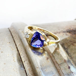 Trilliant Cut Tanzanite with Singular Diamond Accent Yellow Gold Ring