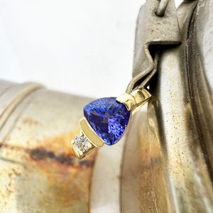 Trilliant Cut Tanzanite with Singular Diamond Accent Yellow Gold Ring