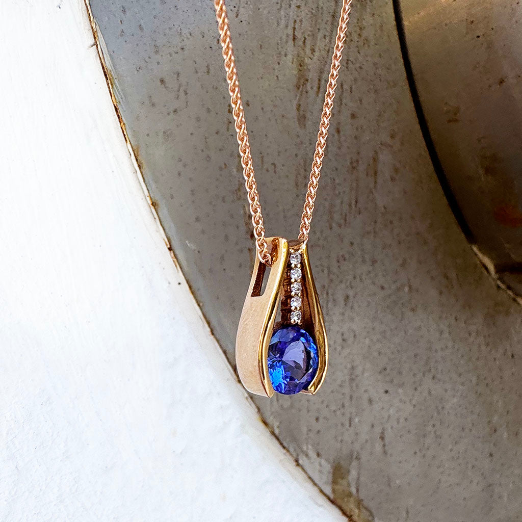 Split Rose Gold Round Tanzanite Pendant with Diamond Stripe Highlight