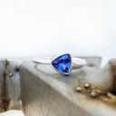 Unisex Thick to Slim Line White Gold Bezel Set Trilliant Tanzanite Ring