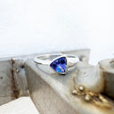 Unisex Thick to Slim Line White Gold Bezel Set Trilliant Tanzanite Ring