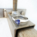 Unisex Thick to Slim Line White Gold Bezel Set Trilliant Tanzanite Ring