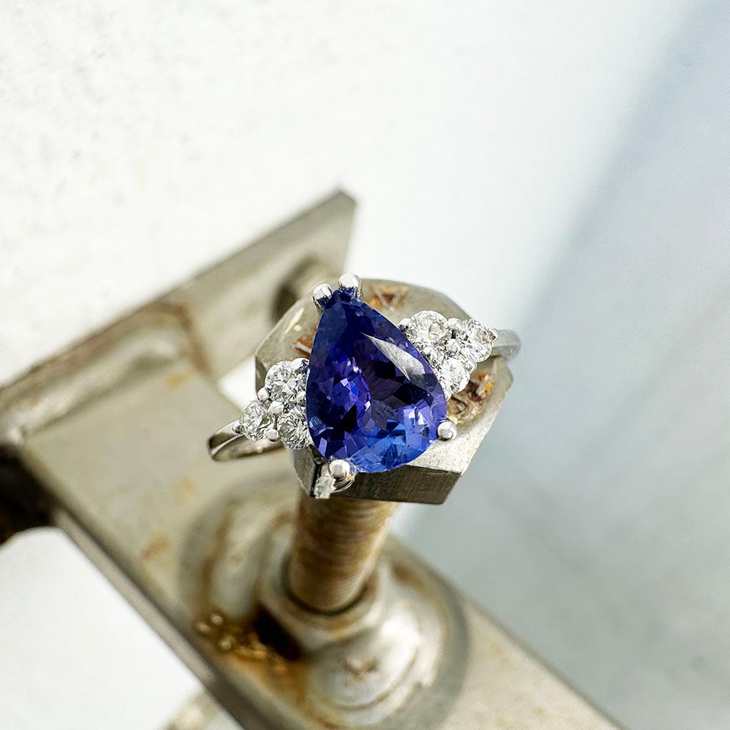 Pear Cut Tanzanite Ring with Trilogy Diamond Accents