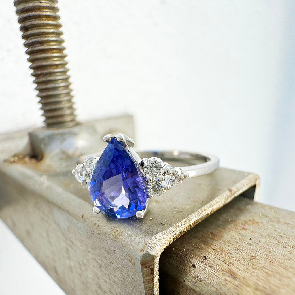 Pear Cut Tanzanite Ring with Trilogy Diamond Accents