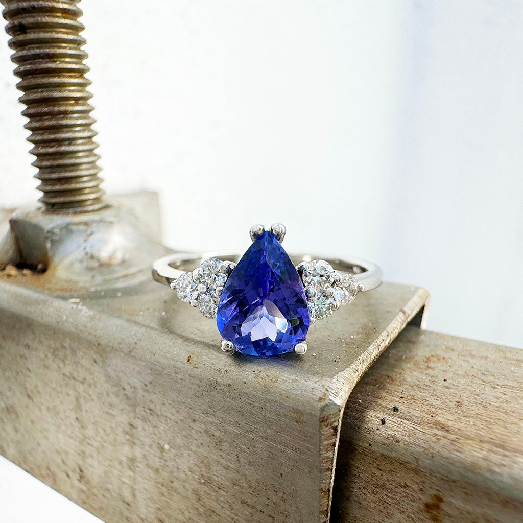 Pear Cut Tanzanite Ring with Trilogy Diamond Accents