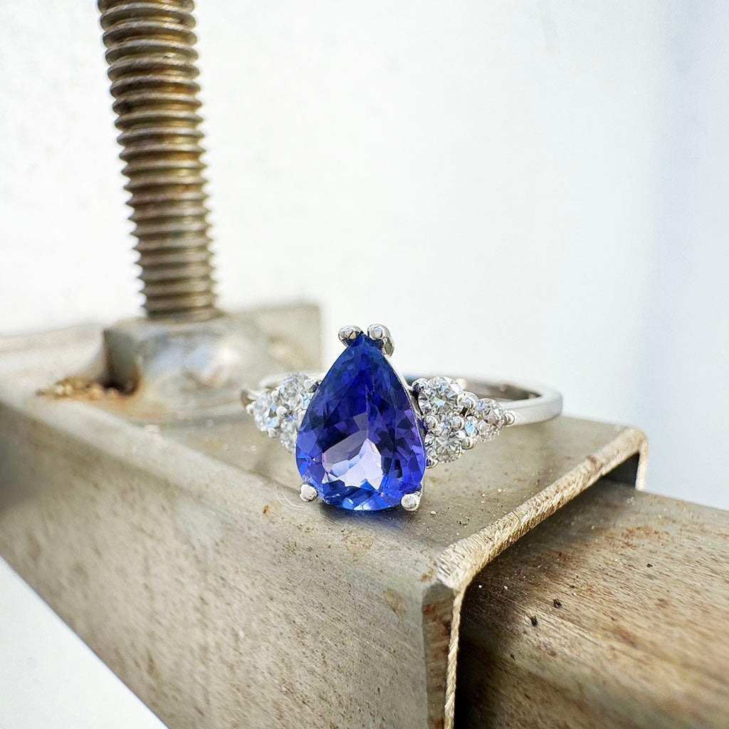 Pear Cut Tanzanite Ring with Trilogy Diamond Accents