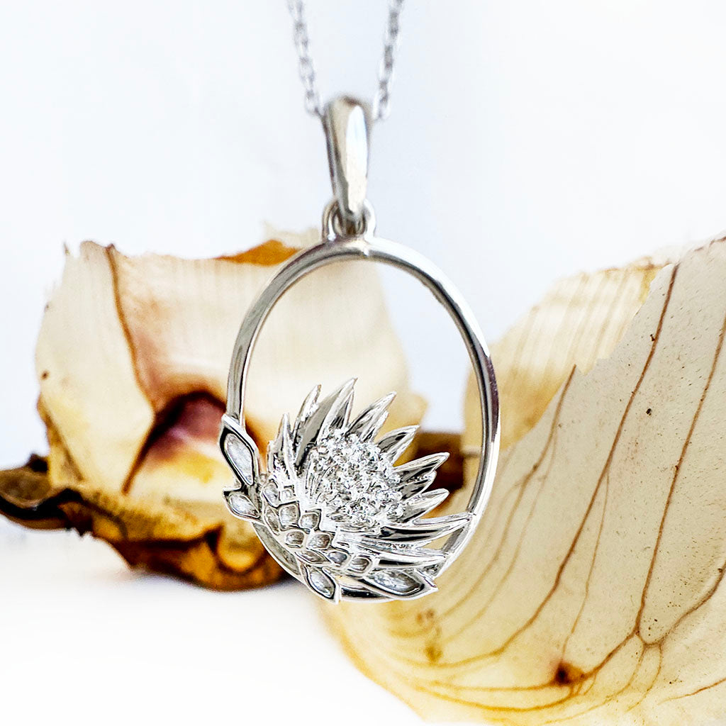 Oval Cut Out Protea Pendant with Diamonds in White Gold