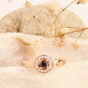 Black and white diamond ring in rose gold