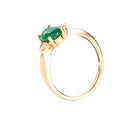 Lightly Crimped Oval Cut Emerald and Diamond Highlight Ring