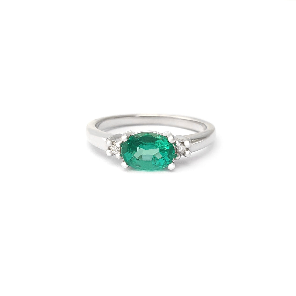 Graceful Oval Emerald and Diamond White Gold Ring