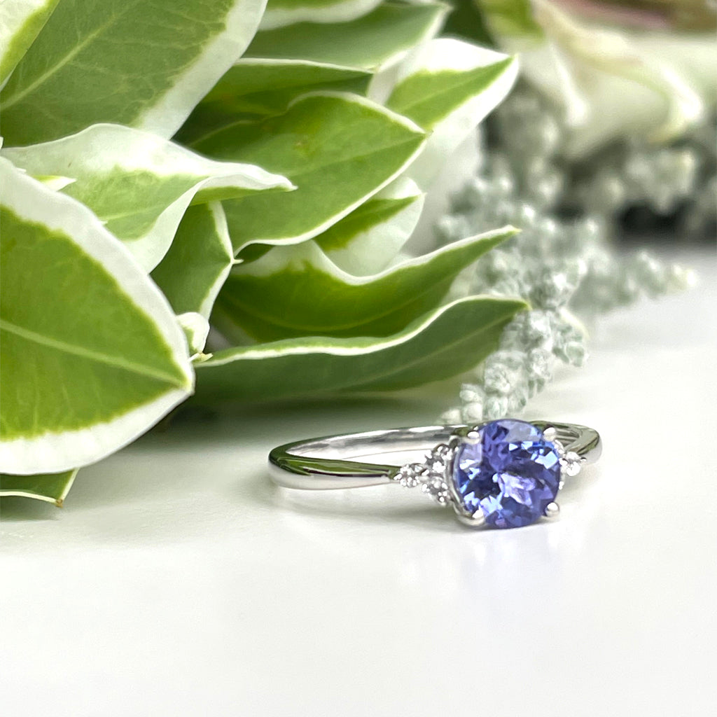 Silver Round Cut Tanzanite with Trilogy Diamond Highlight Ring