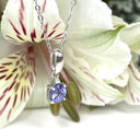 Silver Petite Round Cut Tanzanite with Single Diamond Pendant