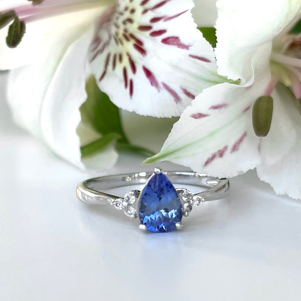 Silver Pear Cut Tanzanite with Trilogy Silver Topaz Highlight Ring