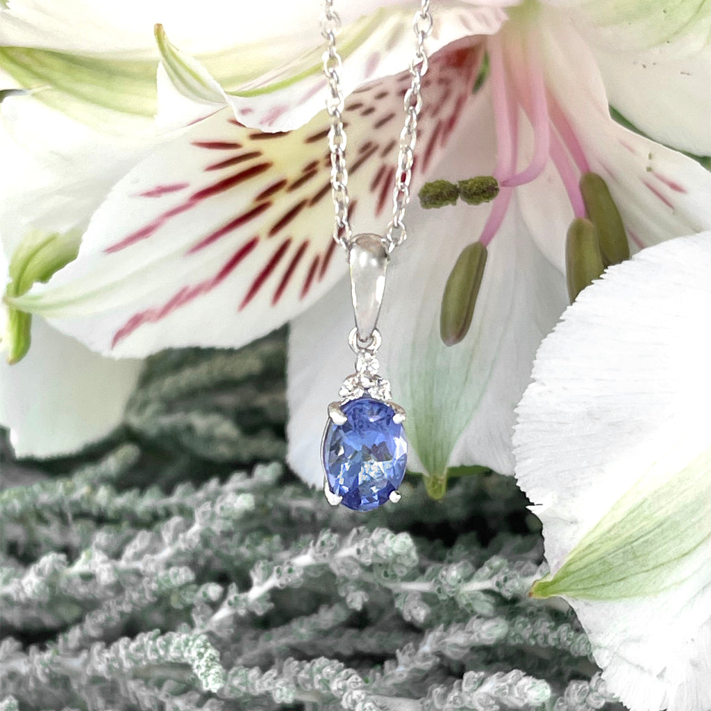 Silver Oval Cut Tanzanite with Trilogy Silver Topaz Highlight Pendant