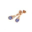 Round Cut Tanzanite and Rose Gold Drop Earrings with Diamond Crown Accent