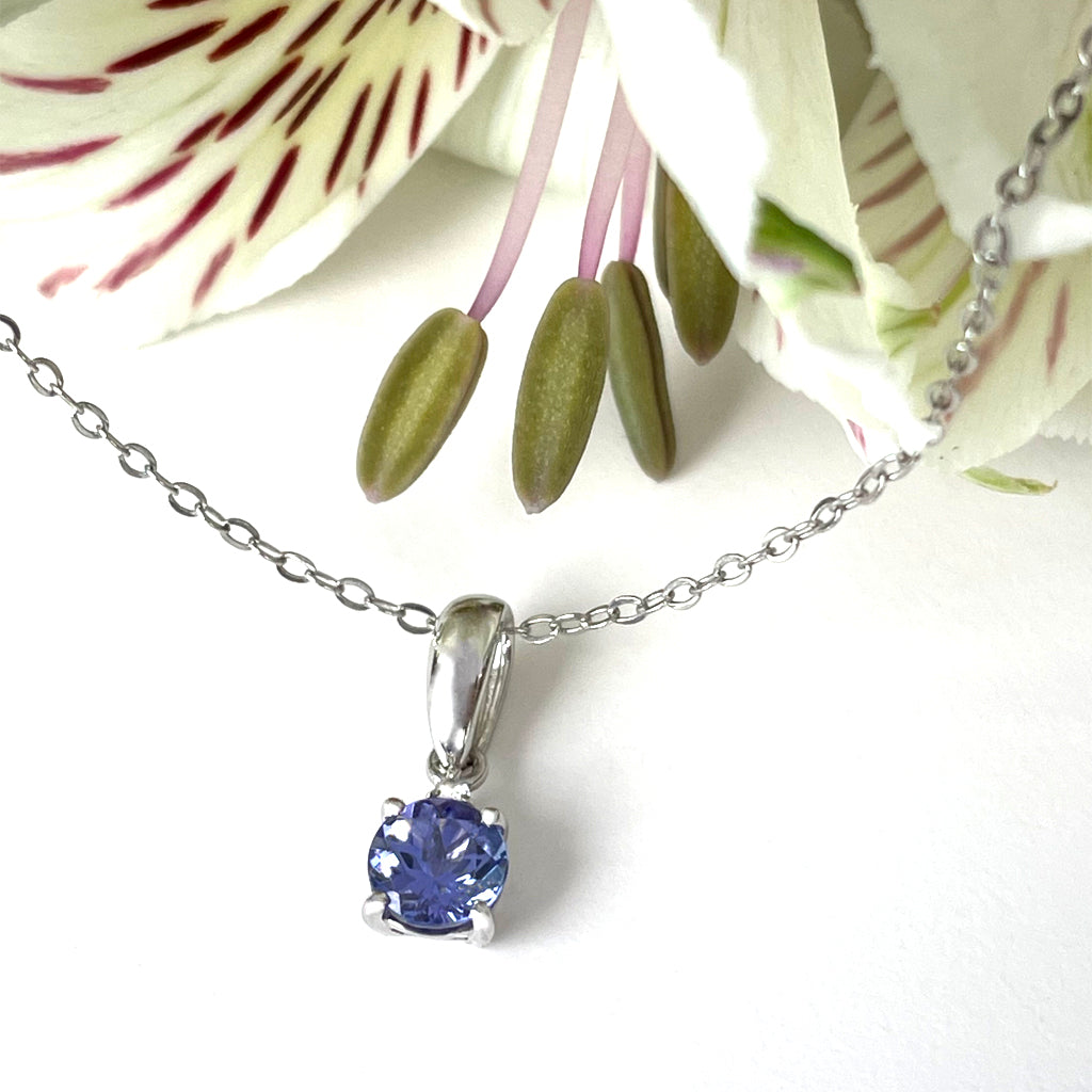 Silver Petite Round Cut Tanzanite with Single Diamond Pendant