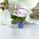 Silver Pear Cut Tanzanite with Trilogy Silver Topaz Highlight Ring