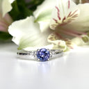Silver Petite Round Cut Tanzanite with Trilogy Diamond Highlight Ring