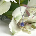 Silver Petite Round Cut Tanzanite with Trilogy Diamond Highlight Pendant