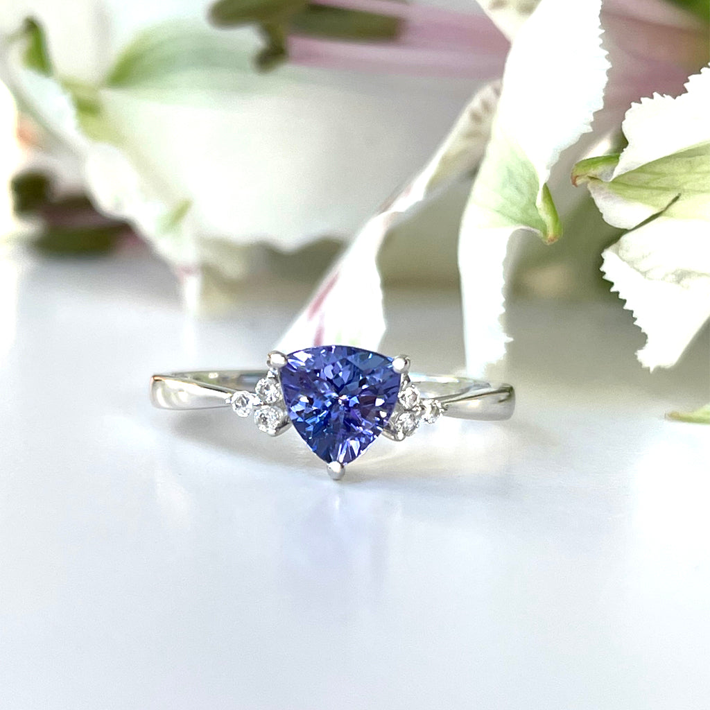 Silver Trilliant Cut Tanzanite with Trilogy Silver Topaz Highlight Ring