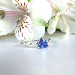 Silver Trilliant Cut Tanzanite with Trilogy Silver Topaz Highlight Ring