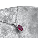 Delicate Split Bale Oval Ruby and Diamond Highlight Pendant