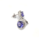 Scintillating Tanzanite with Single Diamond Halo Stud Earrings
