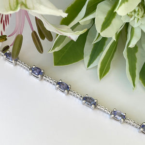 Silver Oval Cut Tanzanite and Silver Topaz Bar Highlight Bracelet