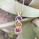 Garnet, Citrine and Amethyst Swirl Pendant in Yellow Gold