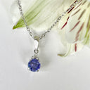 Silver Petite Round Cut Tanzanite with Trilogy Diamond Highlight Pendant