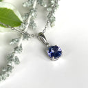 Silver Round Cut Tanzanite with Trilogy Diamond Highlight Pendant
