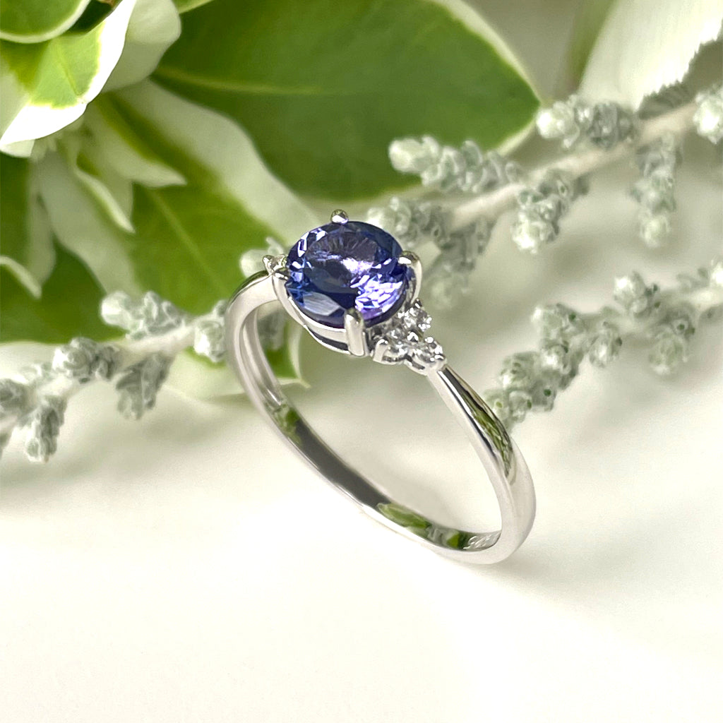 Silver Round Cut Tanzanite with Trilogy Diamond Highlight Ring