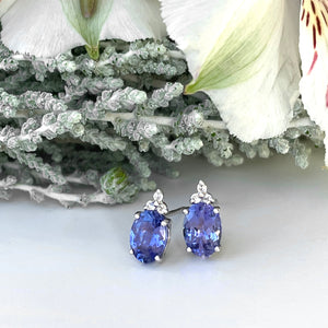 Silver Oval Cut Tanzanite with Trilogy Silver Topaz Highlight Earrings