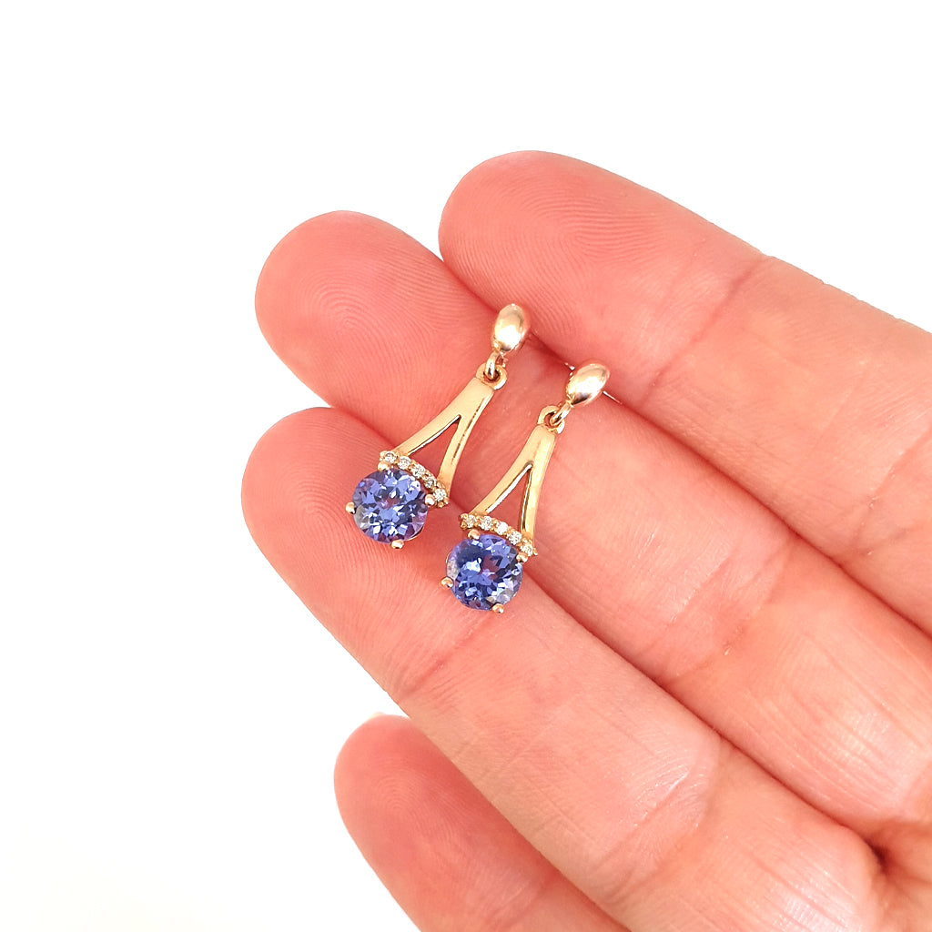 Round Cut Tanzanite and Rose Gold Drop Earrings with Diamond Crown Accent