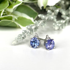 Silver Round Cut Tanzanite with Trilogy Diamond Highlight Earrings