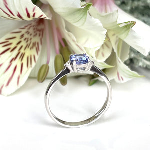 Silver Petite Round Cut Tanzanite with single Diamond Ring