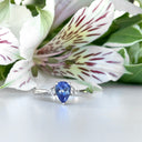 Silver Pear Cut Tanzanite with Trilogy Silver Topaz Highlight Ring